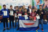 Discipolii Școlii sportive raionale s-au întors cu 8 medalii de la Campionatul municipiului Chișinău la kickboxing